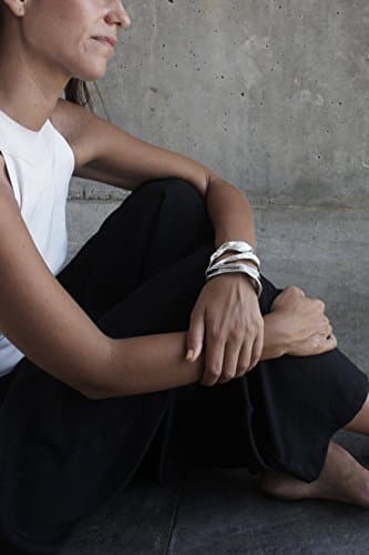 The exotic 'Dune Cuff' in Silvertone, cast in light silvery Aluminum. Inspired by the beach flora, this is a nice statement piece for everyday wear. Get one of Gift one. FREE Shipping worldwide.