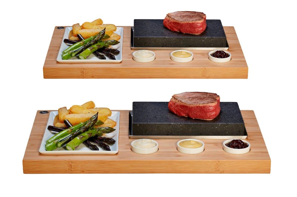 The SteakStones Sizzling Steak Set, an Official SteakStones Hot Stone Cooking Product. A fun, interactive way to enjoy Steak on the Stone using Lava Stone Steak Stones as seen on Dragons Den, Set of 2
