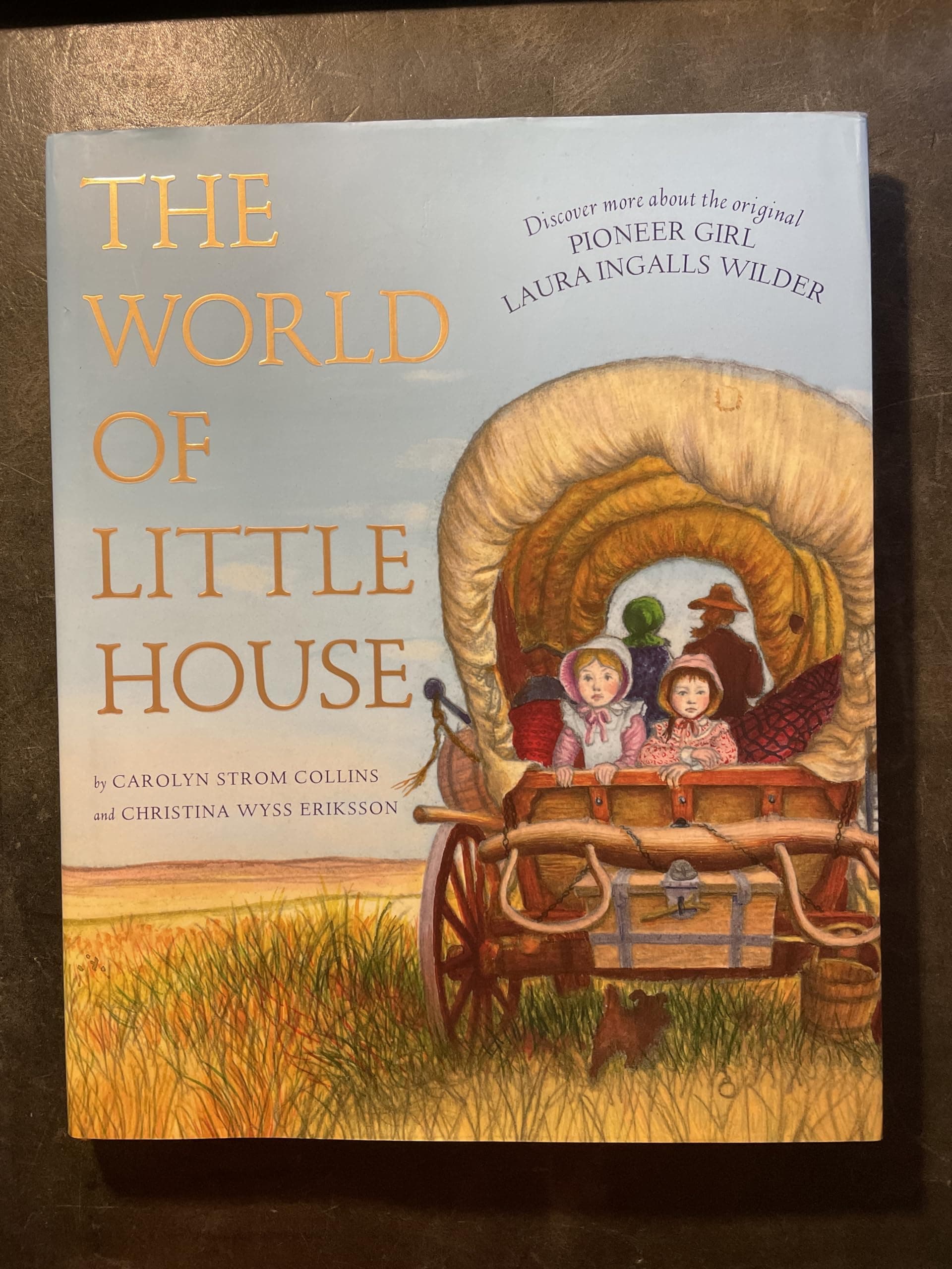 The World of Little House: The Illustrated Biography and Guide to Laura Ingalls Wilder and Pioneer Life (Little House Nonfiction, 31)